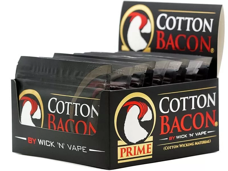 Display-Box mit Cotton Bacon Prime Watte von Wick'n'Vape, schwarze Verpackung mit mehreren Einzelpäckchen